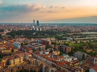 Fototapeta na wymiar Cityscape sunset Milan Italy aerial view