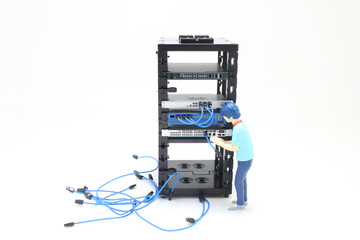 figure IT Engineer in Action Configuring Servers