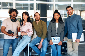 Successful hipster team in coworking. Freelancers.