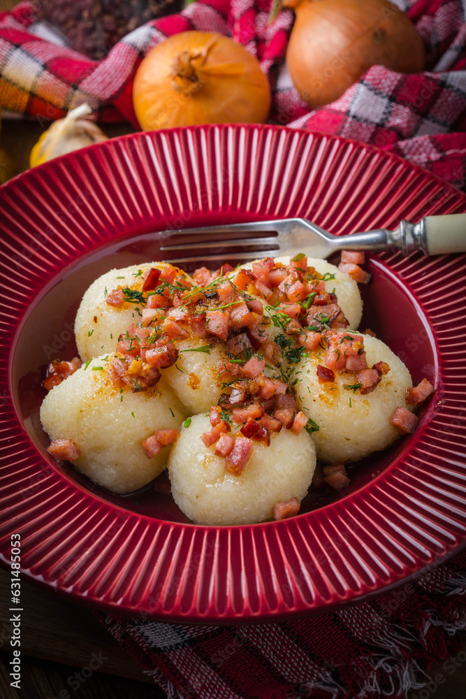 Sticker potato dumplings with bacon.