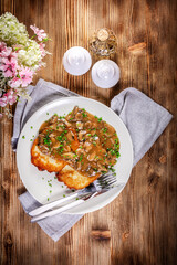 Crispy potato pancakes with mushroom sauce