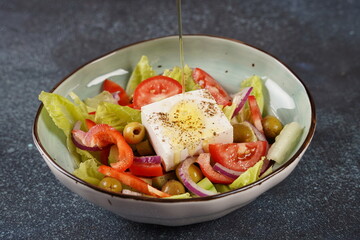 Fresh Greek salad - feta cheese, tomatoes, cucumber, red pepper, green olives and onion