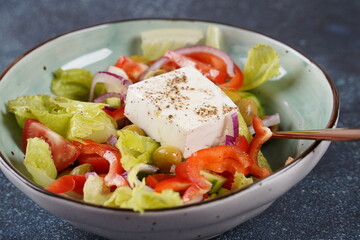 Fresh Greek salad - feta cheese, tomatoes, cucumber, red pepper, green olives and onion