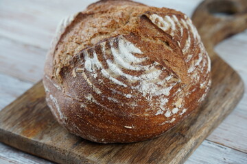 Fresh rye bread or whole grain bread. Healthy baked bread with crispy crust