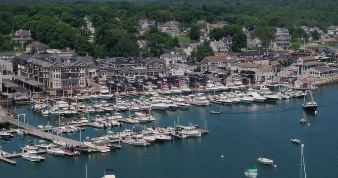 Drone flying over marina in scituate with sailboats at us east coast