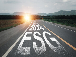 Message on asphalt road ESG 2024 to 2028 Environmentally friendly renewable energy development use...