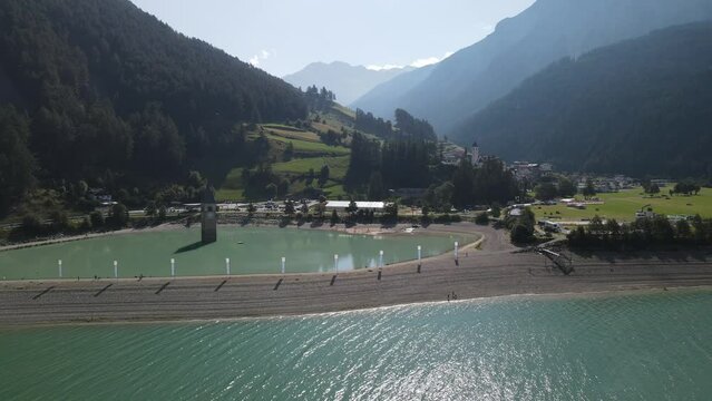 Lake Reschensee in Tirol with the sunken church tower