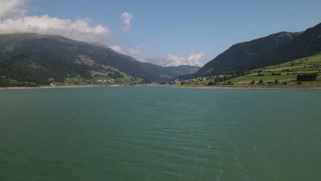 Lake Reschensee in Tirol with the sunken church tower