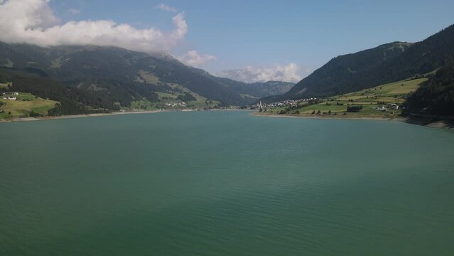 Lake Reschensee in Tirol with the sunken church tower