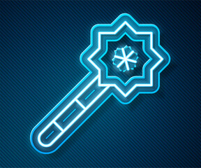 Glowing neon line Magic wand icon isolated on blue background. Star shape magic accessory. Magical power. Vector