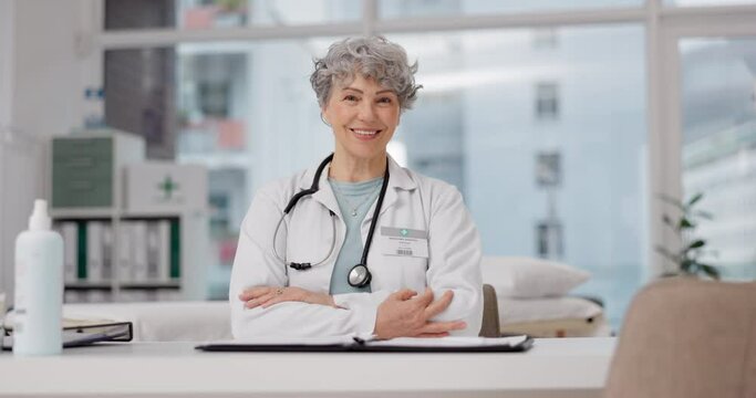 Medical, doctor and arms crossed with face of old woman in office for consulting, wellness and medicine. Healthcare, smile and expert with portrait of person in hospital for surgery and professional