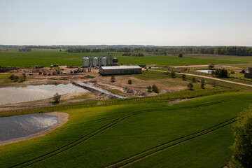 Fototapeta na wymiar Drone photography of agriculture fields and farm buildings
