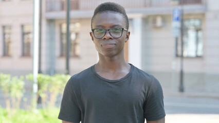 Outdoor Portrait of Young African Man in Denial, Rejecting