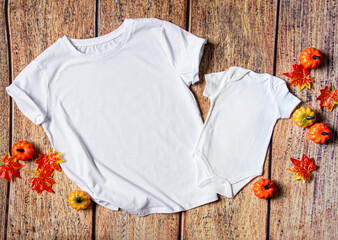 White tshirt and bodysuit Family Siblings Sublimation flat lay on wooden background with halloween...