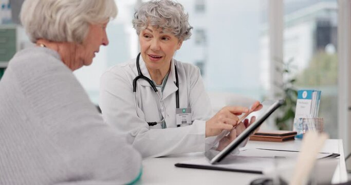 Senior doctor, tablet and talking to patient for healthcare prescription or diagnosis at hospital. Mature medical professional consulting elderly female person on technology for help advice at clinic