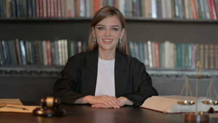 Young Female Lawyer Shaking Head in Acceptance