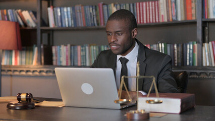 African American Lawyer Working on Laptop