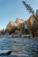 Winter's Serenity: Post-Snowstorm Yosemite National Park Views from Merced River, California, USA,...