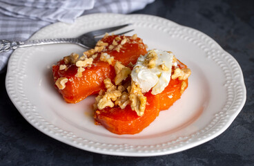 Traditional Turkish Pumpkin Dessert with Cream Butter (Turkish name; Kaymakli bal kabagi tatlisi or kabak tatlisi)