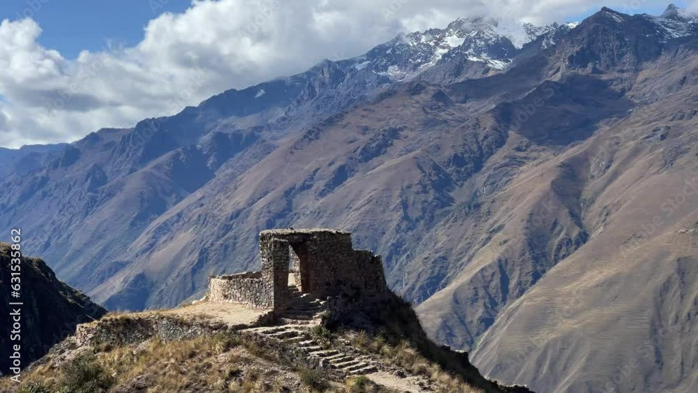 Sticker Ancient Cachicata building on top of a mountain in Peru with a landscape in the background