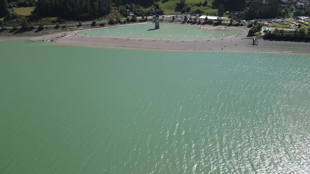 Lake Reschensee in Tirol with the sunken church tower