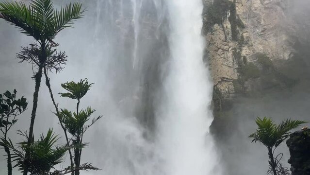 Beautiful flowing Gocta Waterfall in Peru on a sunny day