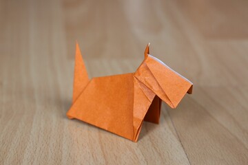 Clsoeup of an Origami of a brown scottish terrier