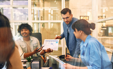 A group of young freelancers working in a coworking space