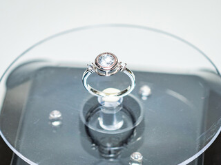 White zircon silver ring display on white background