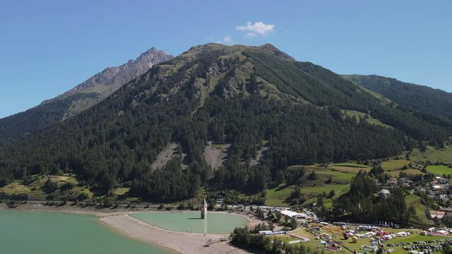 Lake Reschensee in Tirol with the sunken church tower