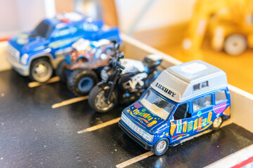 Sweden, Malmo – July 8, 2023: Different toys selling in a second hand store. Garage sale.