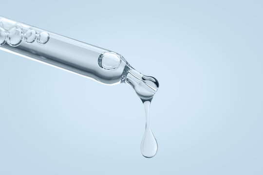 Pipette on blue background with dripping liquid - Powered by Adobe