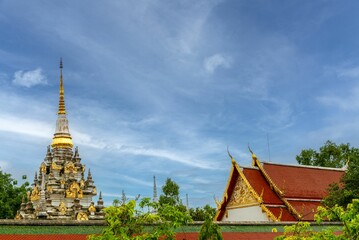 Fototapeta na wymiar Majestic landscape featuring Wat Phra Borommathat Chaiya, a famous Buddhist Temple in Thailand
