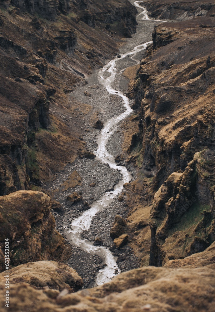 Wall mural Picturesque view of a river winding its way through a canyon