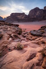 Fototapeta na wymiar Awe-inspiring sunset in Wadi Wadi, a desert located in the Jordanian Treaty region.