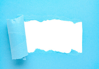 Blue rolled torn paper or curled cardboard message backdrop with rough edges and blank copy space...