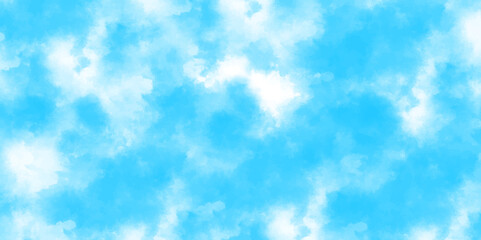 Panorama of blue sky with white clouds. White cumulus clouds formation in blue sky.  Abstract background with blue sky with clouds Retro Washed Out Effect. Ethnic Tie Dye Blue Watercolor background.