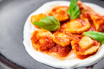 ravioli seafood tomato sauce italian food second course meal food snack on the table copy space food background rustic top view