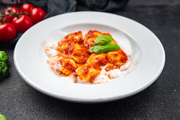 ravioli seafood tomato sauce italian food second course meal food snack on the table copy space food background rustic top view