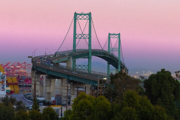 Vincent Thomas Bridge in Long Beach CA with the pier and the San Pedro shipping yard