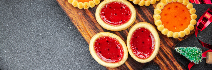 cookies christmas sweets jelly filling holidays dessert christmas treat new year holiday mood snack on the table copy space food background rustic top view