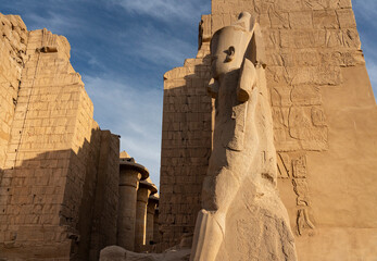 Karnak, Luxor, Egypt. Statue of Pharaoh in the Great Courtyard, Amun-Re Temple
