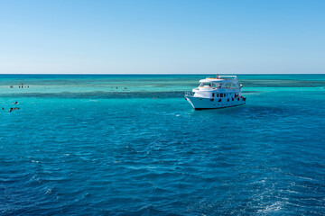 Fototapeta na wymiar Yacht on sea vlue water, Egypt, Ras Mohammed National Park, South Sinai, White island