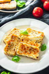 fried cheese halloumi basil meal food snack on the table copy space food background rustic top view