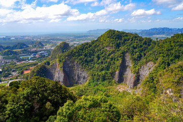 Fototapeta na wymiar Limestone karst cliffs seen from the hilltop pagoda of the Wat Tham Suea, the Tiger Cave Temple of Krabi in the south of Thailand