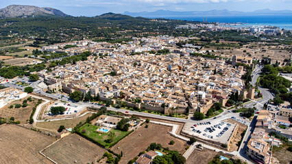 Fototapeta na wymiar Aerial view of the medieval walled city of Alcudia on the Balearic island of Majorca (Spain) in the Mediterranean Sea