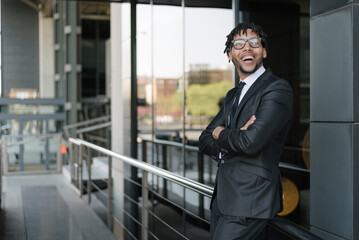 african businessman in suit at street