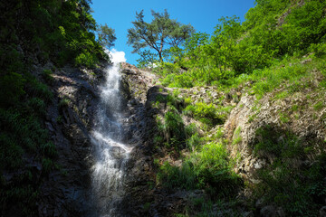 Fototapeta na wymiar 初夏の滝と青空