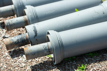 gray barrier posts on the ground