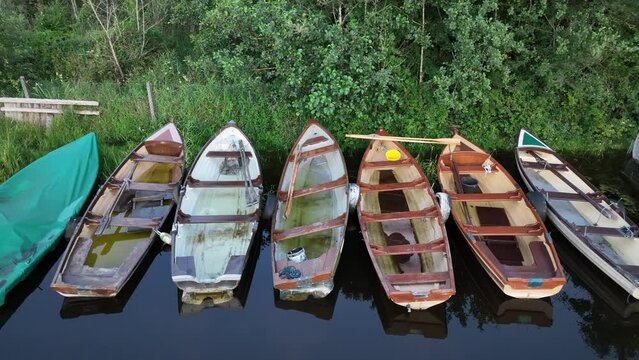 small fishing boats at lough sheelin harbour, county cavan, ireland